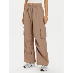 New Balance Долнище анцуг WP43534 Бежов Relaxed Fit