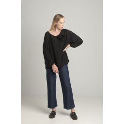 Black oversize blouse with a decorative flower