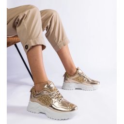 Gemre Caraballo women's gold sneakers with glitter inserts