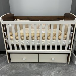 Бебешка кошара Тони 60/120 с подвижна решетка дъб масима + крем