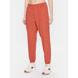 New Balance Долнище анцуг Athletics Nature WP23553 Оранжев Relaxed Fit