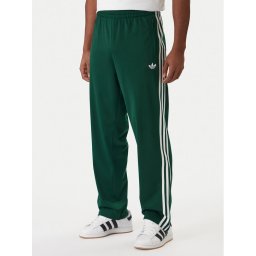 adidas Долнище анцуг Firebird KD8317 Зелен Loose Fit