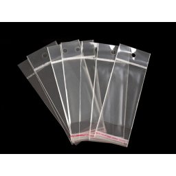 PP sáček s lepicí klopou a závěsem 5x9 cm, barva transparent
