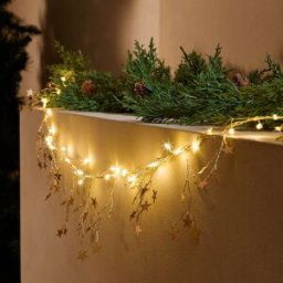 El Corte Inglés Guirnalda decorativa Estrellas metal con 60 luces LED Navidad. Dorado