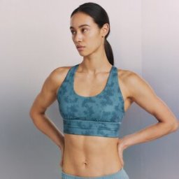 Boomerang Top de tirante cruzado de yoga de mujer . (L) Azul pálido