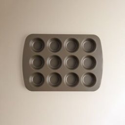 El Corte Inglés Molde de acero con 24 mini cavidades para repostería. (39 cm) Marrón