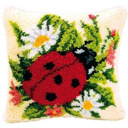 Devant de coussin au point noué ""coccinelle