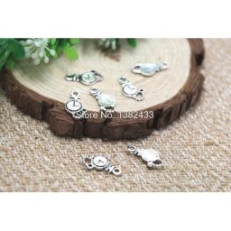 Breloques antiques tibétaines en argent pour montre de poche pendentifs 17x9mm 60 pièces