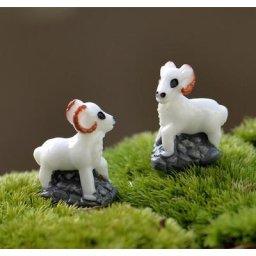 Statue de chèvre avec roche figurine l'inventaire décoration de jardin féerique dessin animé