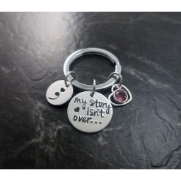 Porte-clé en argent demi-collier mon histoire n'est pas encore finie bijoux de Pause de