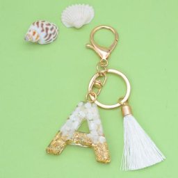 Porte-clés en résine scintillante avec lettres initiales et glands pour femme porte-clés de sac à