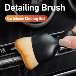 Nettoyage d'intérieur de voiture brosse de dépoussiérage sortie d'air douce de tableau de bord