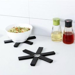 Dessous de plat noir pliable antidérapant résistant à la chaleur napperon support de Pot tapis