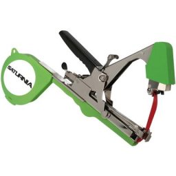 Machine à lier agricole avec ruban, agrafes, couteau et ressort