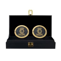 Coffret contenant les répliques des plaque latérales du titre du Women's Championship de Charlotte