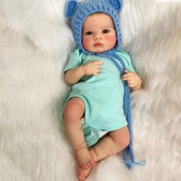Bébé fille réaliste de 49cm fille populaire avec Bonnets de combinaison colorés corps doux haute