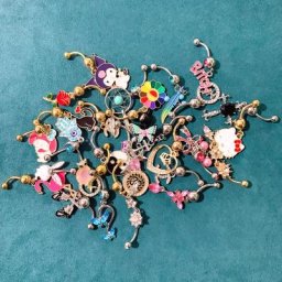 Anneaux de ventre pour piercing au nombril bijoux de corps 1000 différents modèles envoyer par