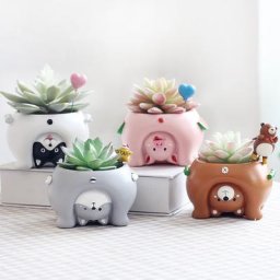Pots de fleurs d'animaux de dessin animé à l'envers jardinières faites à la main en résine pour