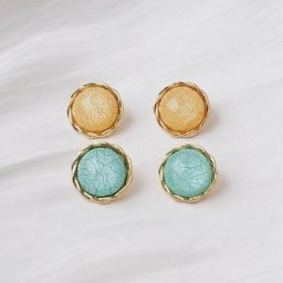 Boucles d'oreilles rondes en métal à rayures marbrées orange pour femmes conception latérale