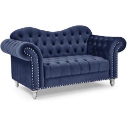 Deco In Paris - Canapé 2 places chesterfield courbé en velours bleu foncé et pieds en métal argenté