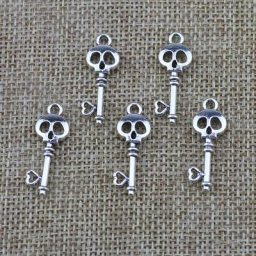 Pendentif à breloques en argent antique modules de crâne de document clé Seton résultats de