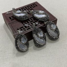 Pendentif de bijoux à la mode accessoires naturels coquille d'ormeau bord de plume Bracelet