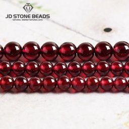 Vente en gros Fine AAA + naturel rouge foncé vin grenat rond perles de pierres précieuses en vrac