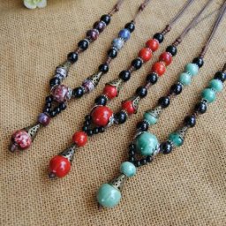 Collier pendentif de style ethnique rétro fait à la main perle en céramique chaîne de chandail