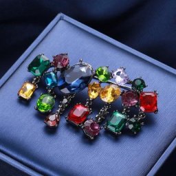 Broche en cristal coloré de personnalité exagérée pour femme pull de tempérament manteau imbibé