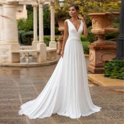 Robe de mariée en mousseline de soie sans manches col en V ligne A plis plage style Boho