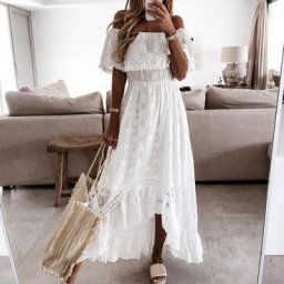 Robe longue blanche en dentelle ajourée taille haute et basse avec ourlet épaules dénudées
