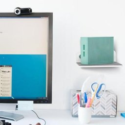 Mini haut-parleur intelligent avec trou de câble de charge capacité de charge utile conception non