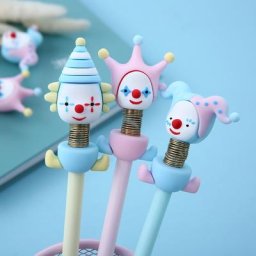 Stylo à bille gel Clown mignon nouveauté jouet de beurre secouant stylos à encre noire pour