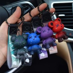Porte-clés ours à changement de documents en résine de dessin animé pour hommes et femmes pendentif