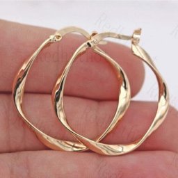 Boucles d'oreilles créoles en métal couleur or classique à la mode simples rondes ondulées
