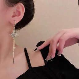 Boucles d'oreilles pompon fleur pour dames maille évidée exagérée rétro européen tempérament