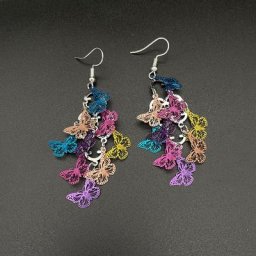 Neuf pièces boucles d'oreilles papillon vol oblique longue Dangle métal couleur mixte boucle
