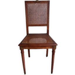 Chaise cannée art déco avec ornements en bronze. bois 44x42x91