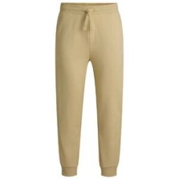 Pantalon BOSS PANTALON DE SURVÊTEMENT EN COTON ÉPONGE JAUNE AVEC LOGO Jaune