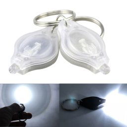 2 PCS Mini poche porte-clés lampe de poche Micro LED Squeeze Light Camping extérieur ultra-lumineux d urgence porte-clés lampe torche lampe (Blanc)