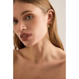 Boucles d'oreilles créoles cône Evolve Rachel Jackson en Gold chez Anthropologie
