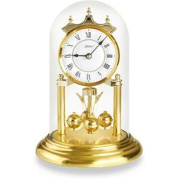 AUTRE Pendule 400 jours en métal doré 23 cm chiffres romains