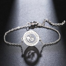 Lusta cica, kristályokkal díszített nemesacél karlánc