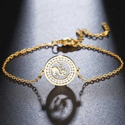 Lusta cica, kristályokkal díszített nemesacél karlánc - aranyozott