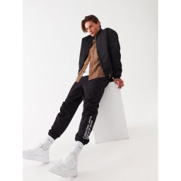 Calvin Klein Jeans Melegítő alsó J30J322639 Fekete Regular Fit