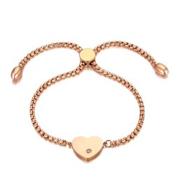 Szív díszes nemesacél karkötő kristállyal, rozé arany bevonattal