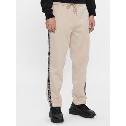 Calvin Klein Jeans Melegítő alsó Logo Tape J30J324376 Bézs Relaxed Fit