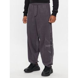 Calvin Klein Jeans Melegítő alsó Monologo J30J324953 Szürke Relaxed Fit