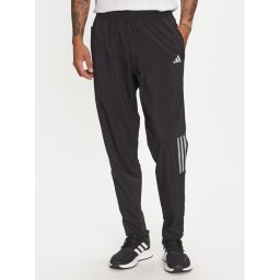 adidas Melegítő alsó Own the Run HR6611 Fekete Regular Fit