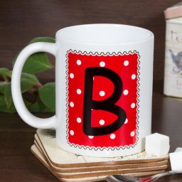 Pöttyös monogramos rózsaszín bögre